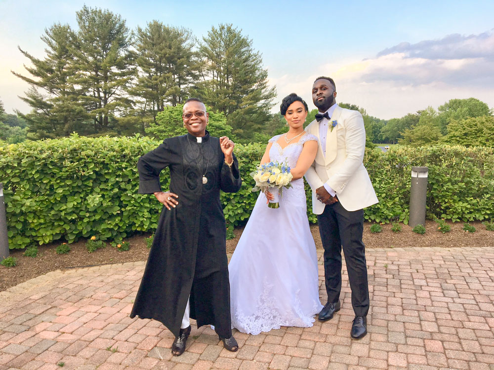 African American couple marrying at the William Bolger Center with MD wedding officiant Starlene, celebrating their special day