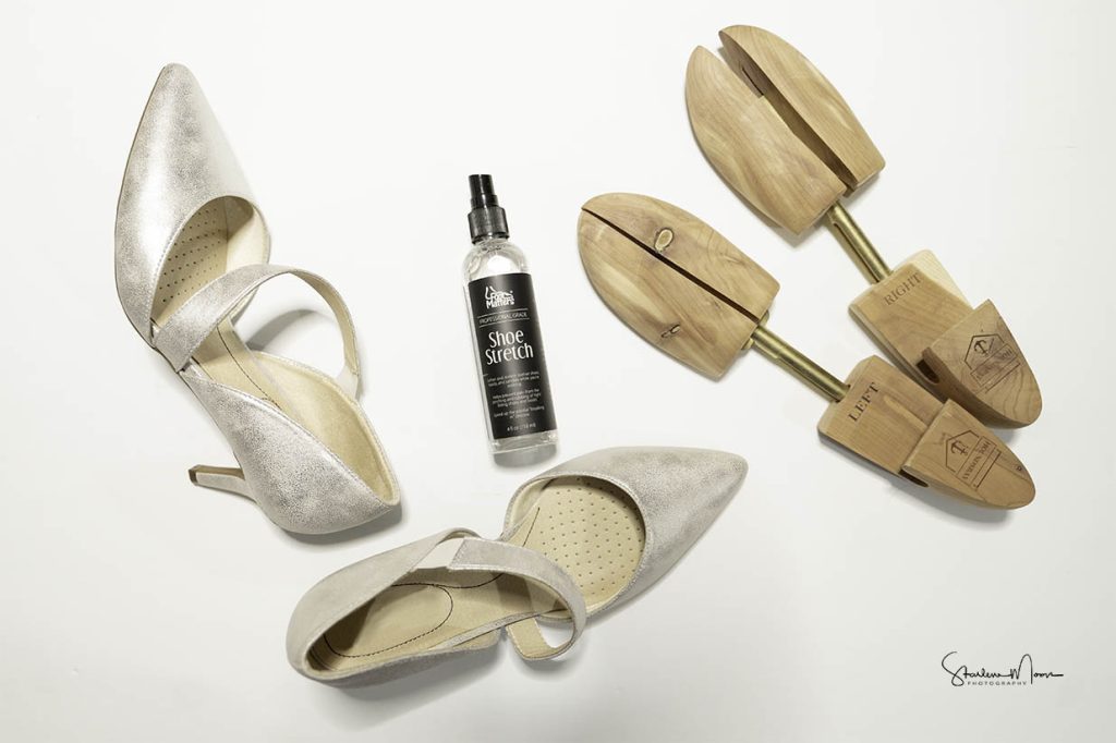 A close-up of wedding shoes, highlighting areas to focus on during the stretching process for optimal comfort.​