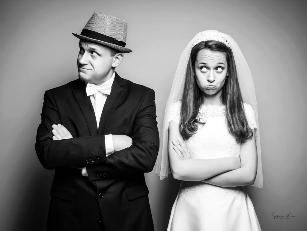 Bride and groom yelling at each other on their wedding day – visual metaphor for missing the marriage license.