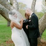 Biracial couple’s civil ceremony with officiant Starlene at a Virginia wedding venue, celebrating love and unity.